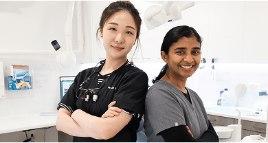 Smiling dentists at Mulgrave Dental Group.