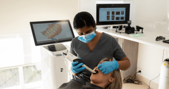 Dr. Diluni getting a 3D scan of a Mulgrave Dental Group patient.