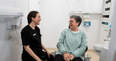 Mulgrave Dental Group Oral Health Therapist educating a patient during their dental visit. Our team is here to make sure you feel at ease and confident in your dental journey.