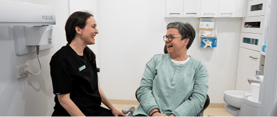 Mulgrave Dental Group Oral Health Therapist educating a patient during their dental visit. Our team is here to make sure you feel at ease and confident in your dental journey.