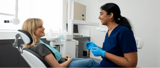Dr. Diluni Perera from Mulgrave Dental Group, having a consultation with a patient.