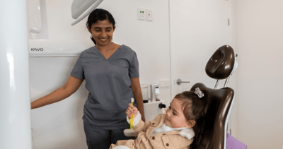 Mulgrave Dental Group dentist examining a child's teeth during a dental check-up.