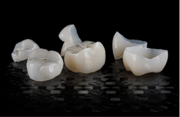 Close up of porcelain dental crowns.