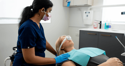 Dr. Diluni and a Mulgrave Dental Group patient undergoing general anaesthesia.