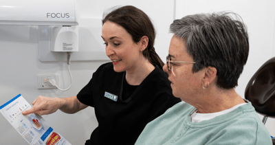 Mulgrave Dental Group Oral Health Therapist educating a patient during their dental visit. Our team is here to make sure you feel at ease and confident in your dental journey.