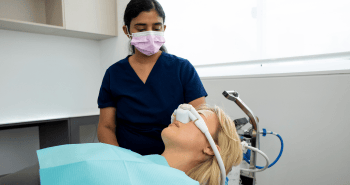 Dr. Diluni and a Mulgrave Dental Group patient undergoing general anaesthesia.