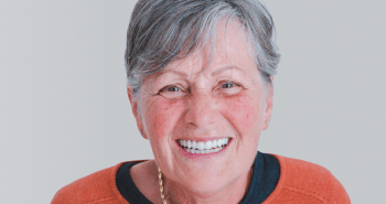Mulgrave Dental Group smile makeover patient with a big smile, showing a full set of beautiful, natural looking teeth.