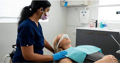 Dr. Diluni and a Mulgrave Dental Group patient undergoing general anaesthesia.