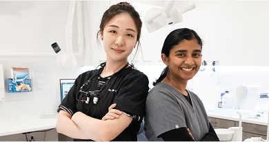 Smiling dentists at Mulgrave Dental Group.