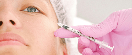 A woman getting an anti-wrinkle injection.