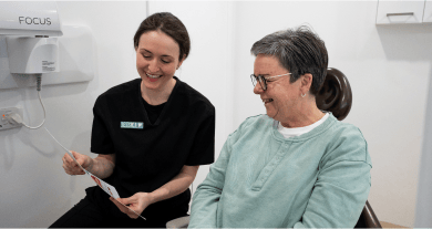 Mulgrave Dental Group Oral Health Therapist educating a patient on how best to maintain their oral health.