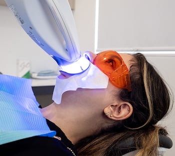 A Mulgrave Dental Group patient receiving Zoom Teeth Whitening.