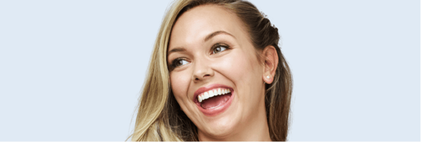 Smiling woman with a beautifully aligned smile.