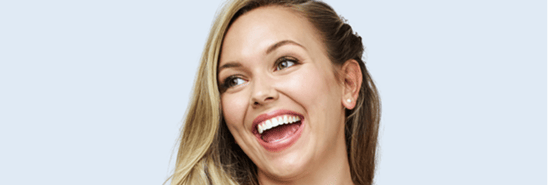 Smiling woman with a beautifully aligned smile.