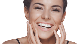 Close up of a smiling woman with a radiant, bright smile.