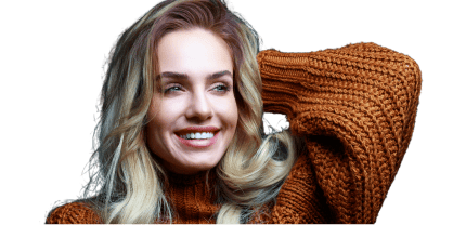 A smiling woman with a radiant, bright smile.