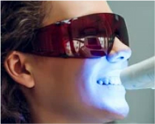 Patient Undergoing Teeth Whitening Wearing Goggles - Mulgrave Dental Group 